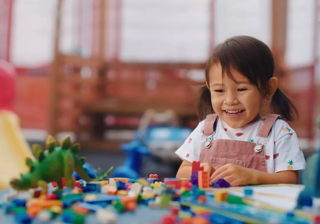 Preschool Girl with Building Blocks