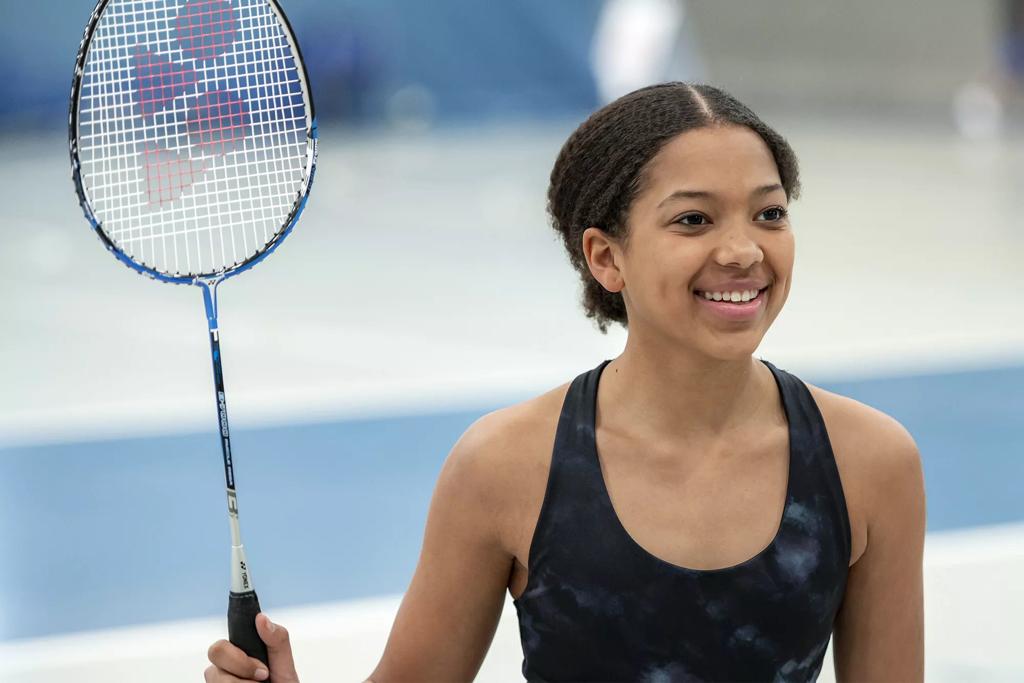 Teen Girl Playing Badminton