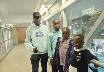 James Atem and family at the Downtown Y