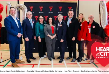 Group photo of dignitaries attending Heart of the City event