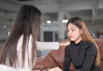 [Image] Woman Comforting a Youth