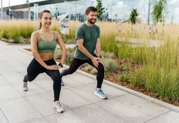 two people doing outdoor workout