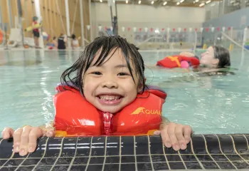 smiling child in the pool
