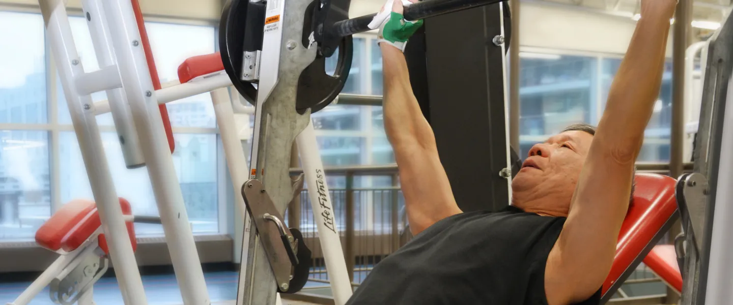 Man Lifting Weights at Downtown Y