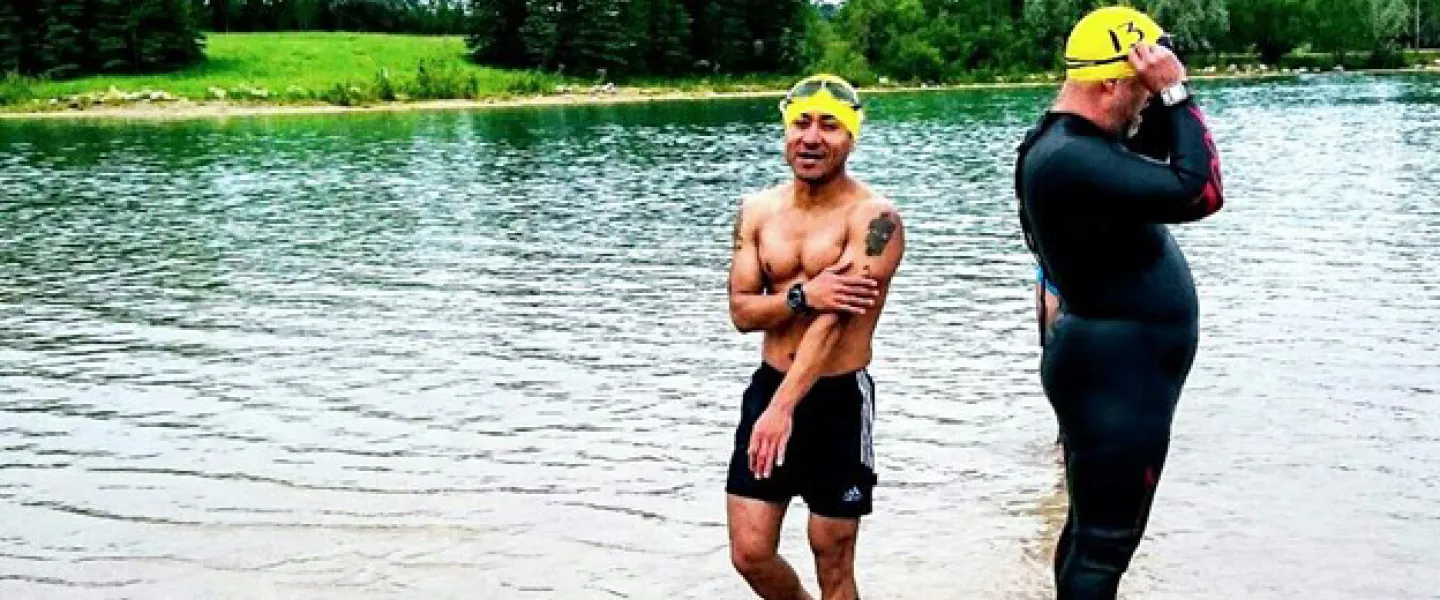 Fidey Pacay competes in his first triathlon after learning to swim at the Y
