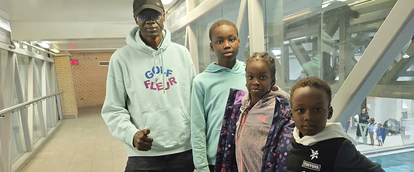 James Atem and family at the Downtown Y