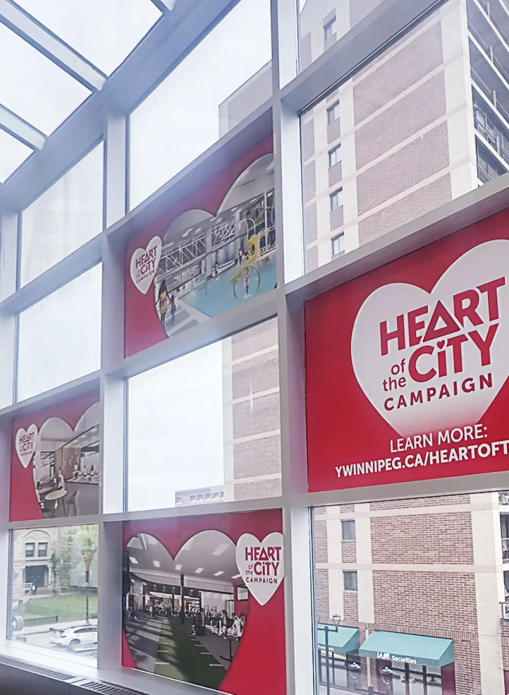 Photo of the Downtown Y atrium with Heart of the City signage