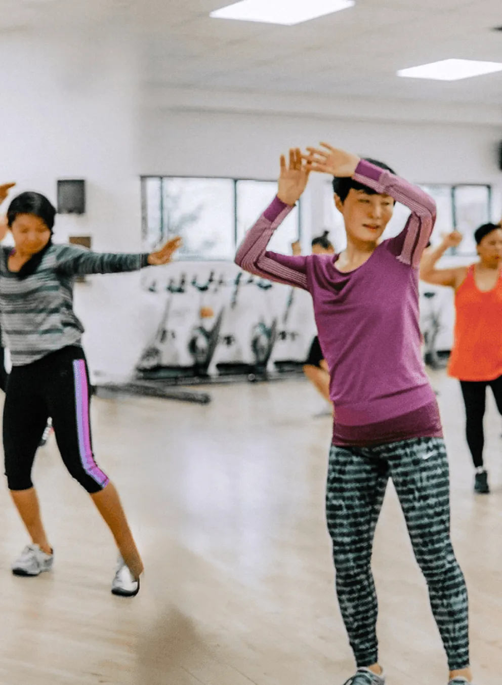 Women in large room during exercise class