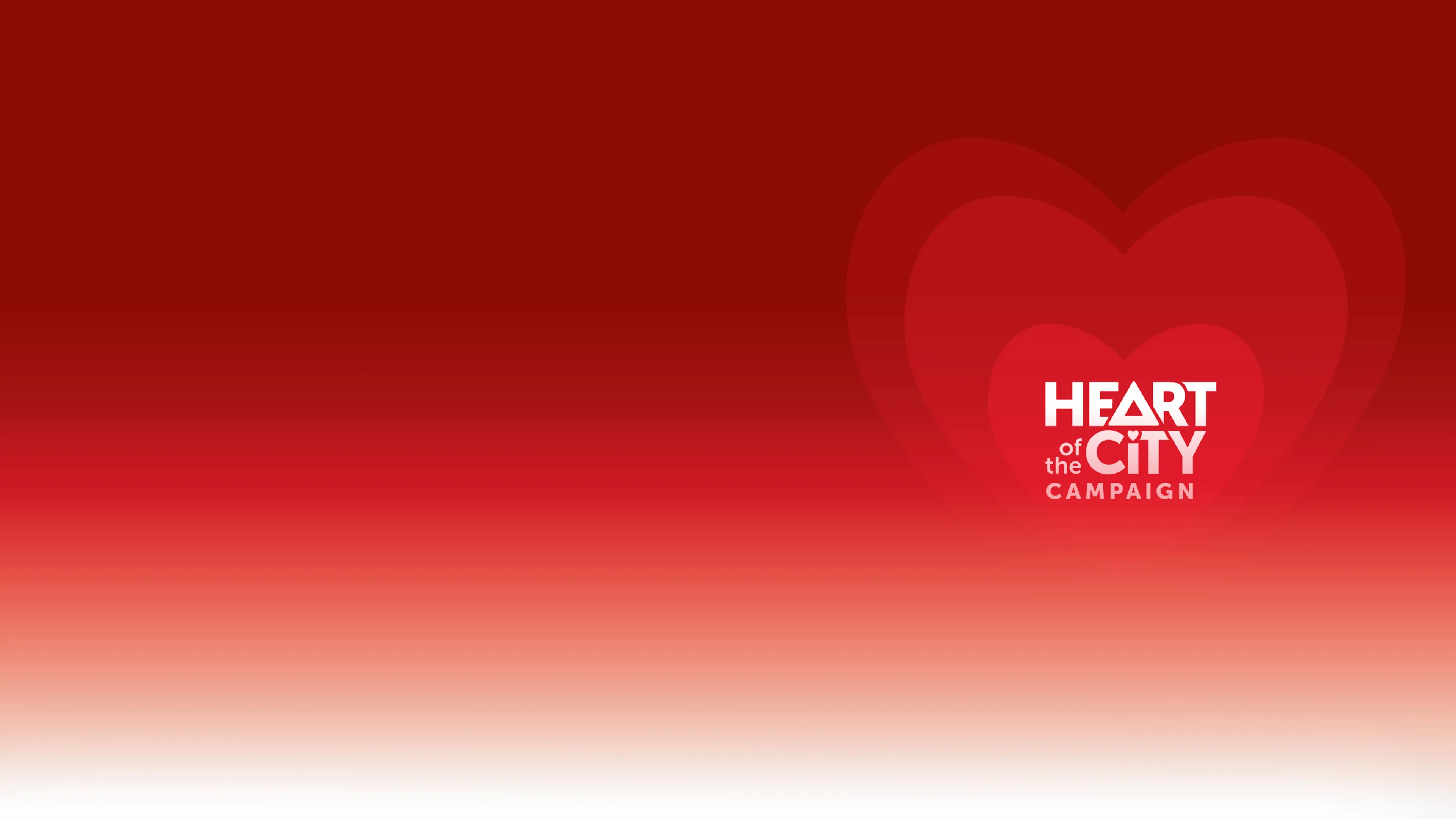 Logo for Heart of the City Campaign on a Red Background