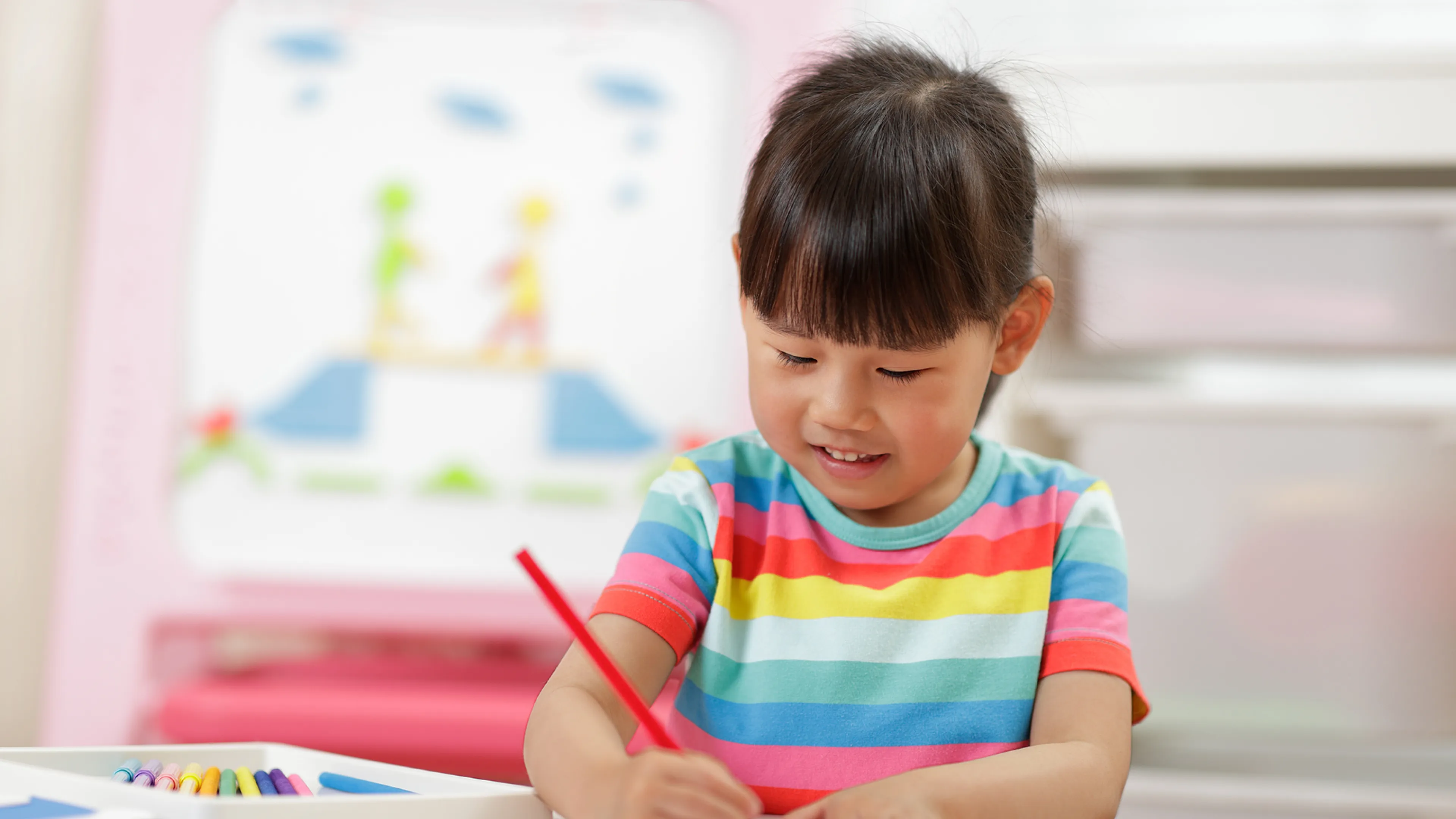 image of asian girl colouring