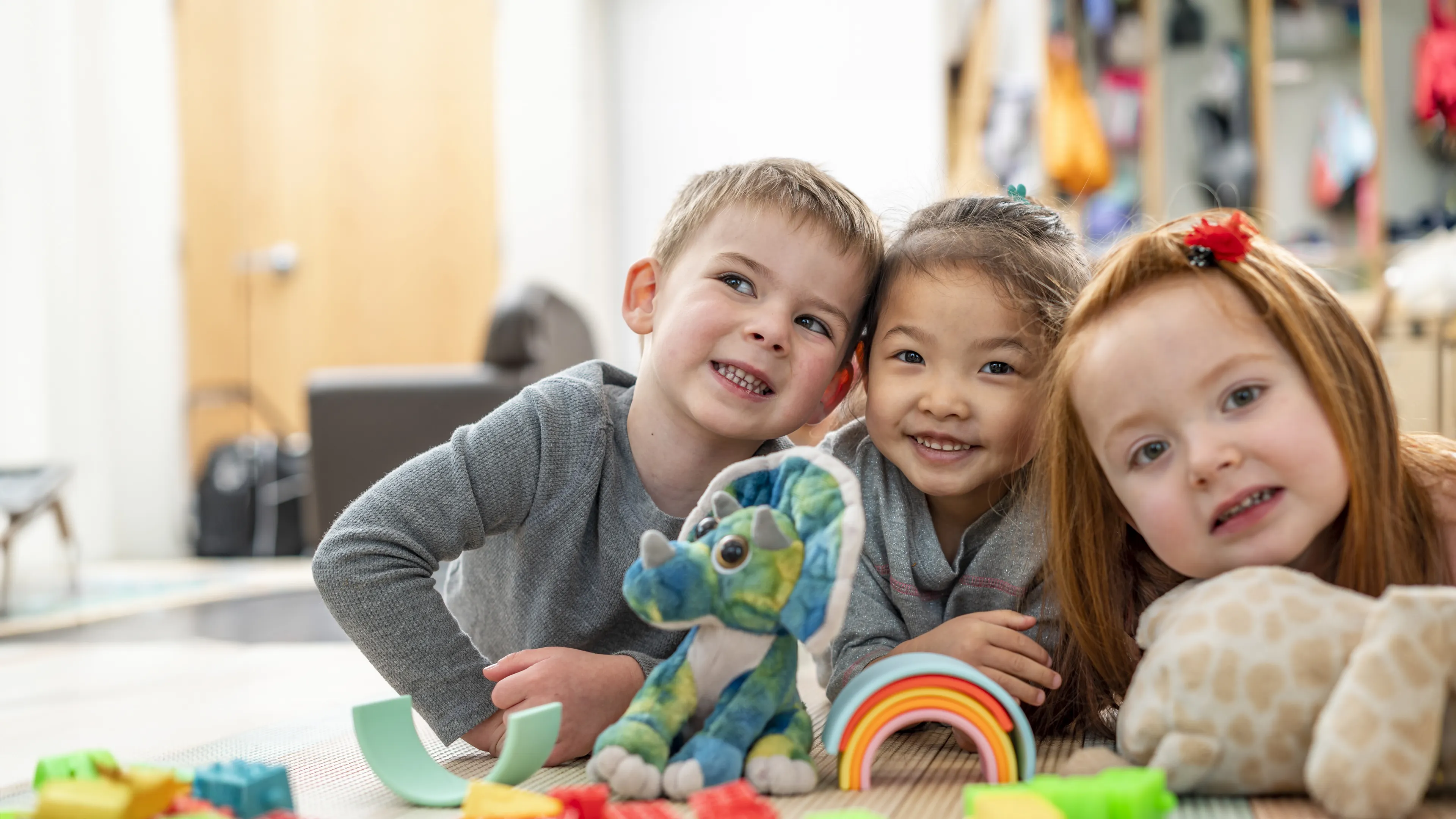 [Image] three kids at child care centre