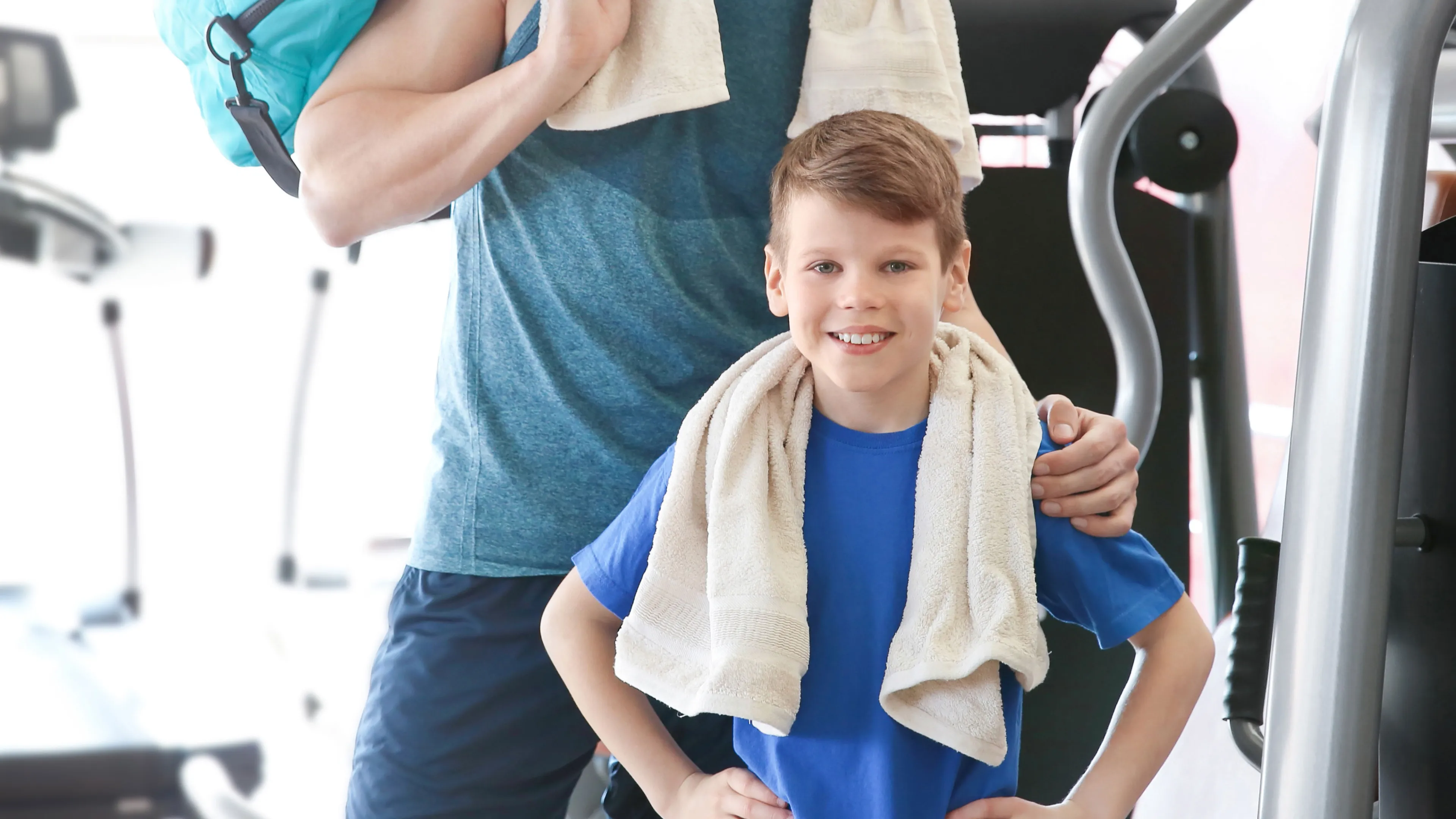 boy and man in the gym