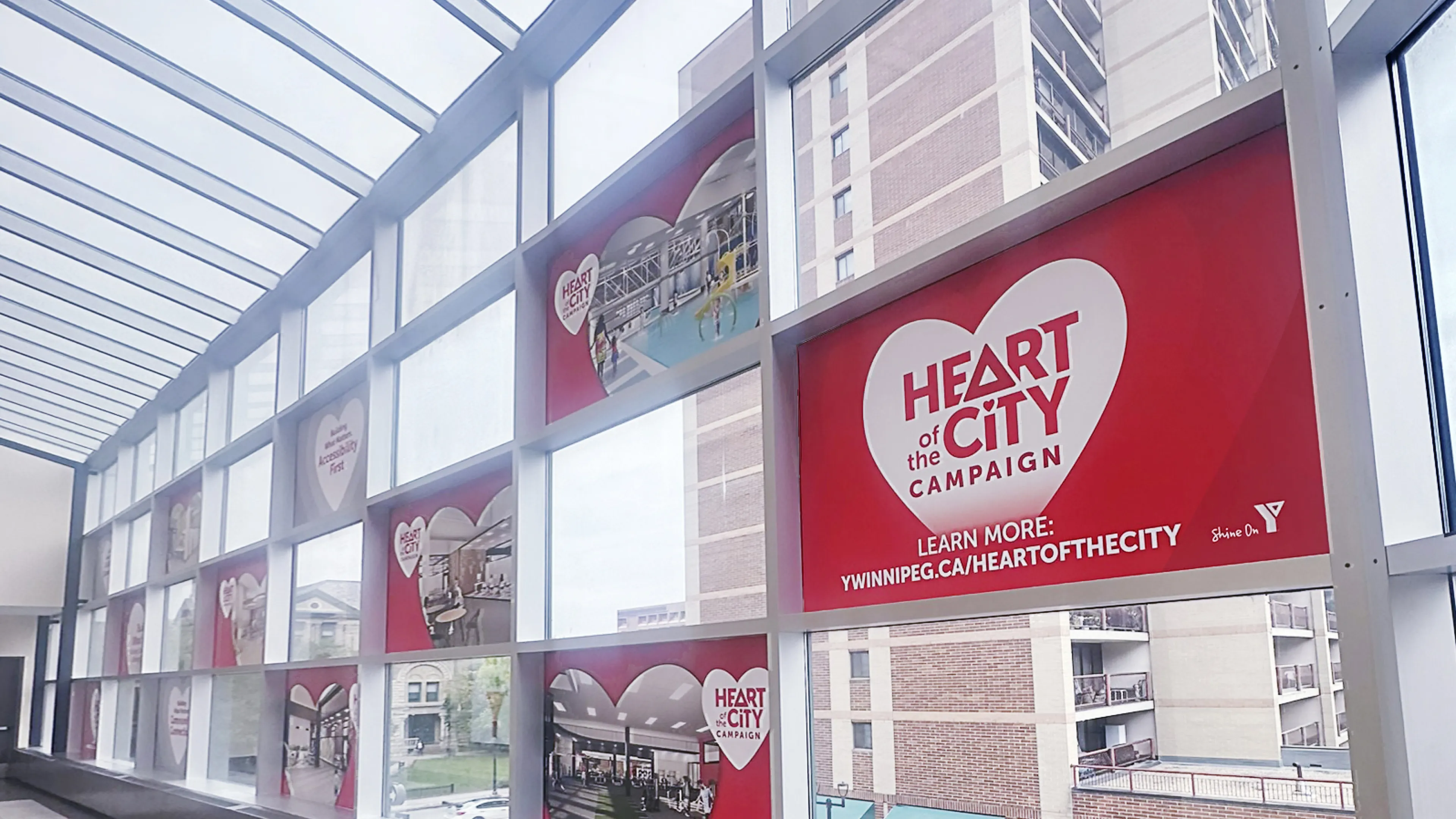 Photo of the Downtown Y atrium with Heart of the City signage