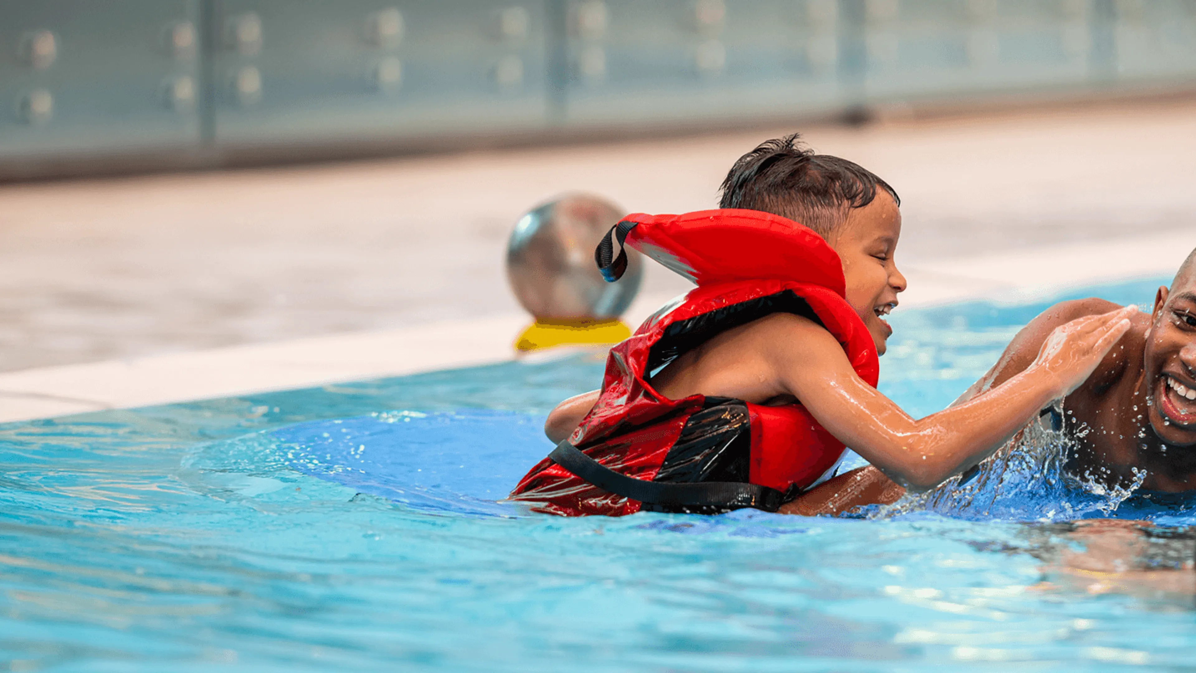 People playing in swimming pool