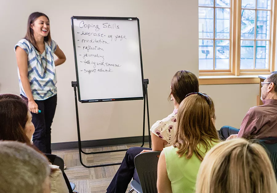 Woman Leading Workshop on Coping Skills