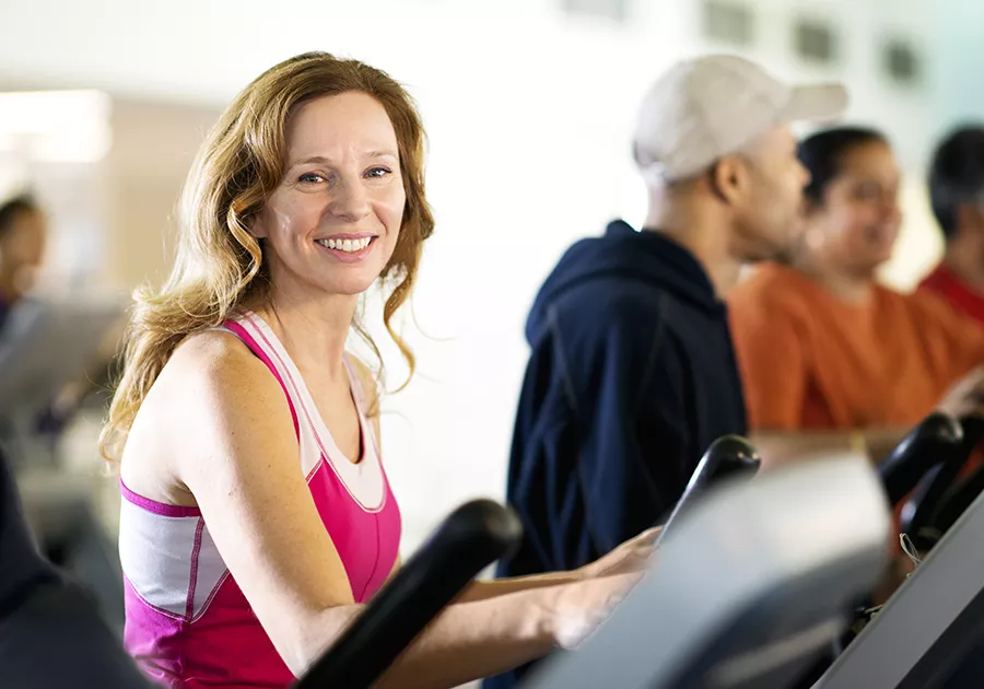 Woman Using Cardio Step Machine