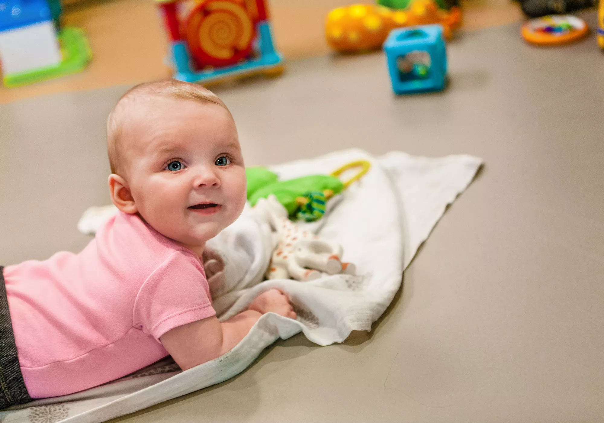 Infant Playing on Blanket