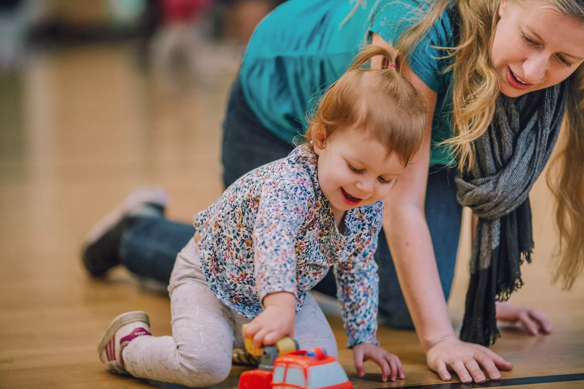 Mom and Preschooler Playing in Gym