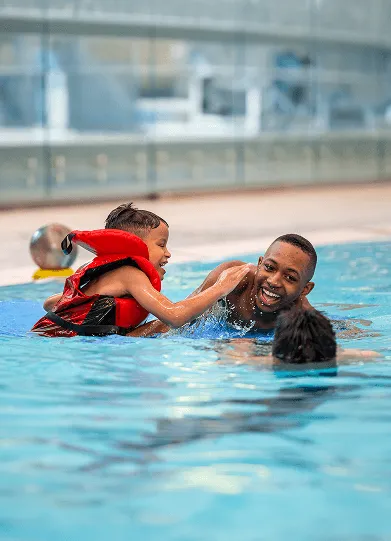 People playing in the pool