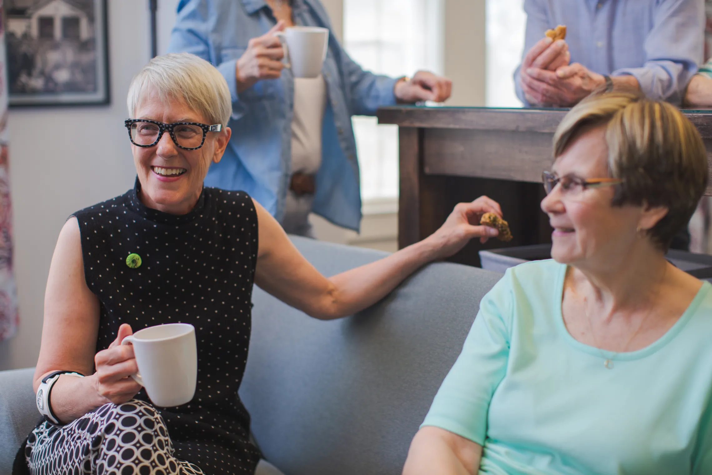 Seniors enjoying coffee together