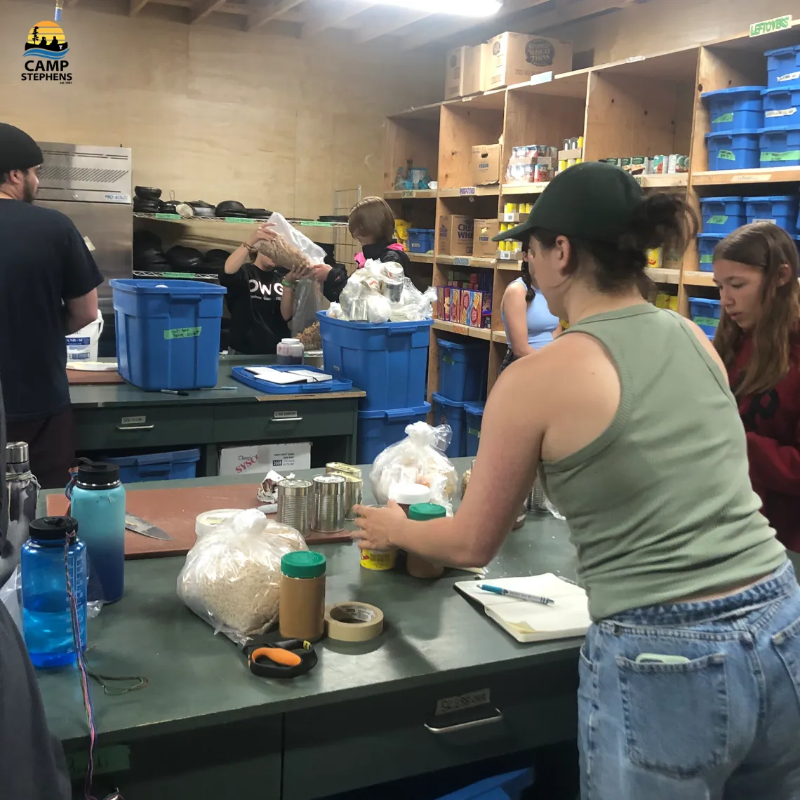Campers prepping supplies for their trip