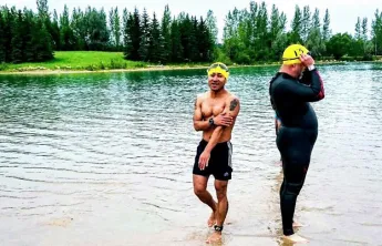 Fidey Pacay competes in his first triathlon after learning to swim at the Y