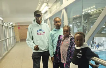 James Atem and family at the Downtown Y