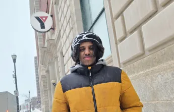 Zakariya in front of the Downtown Y
