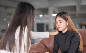 [Image] Woman Comforting a Youth