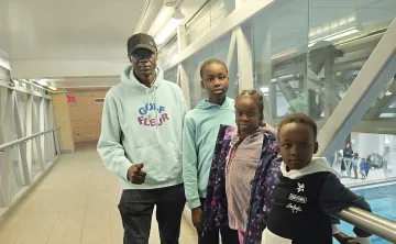 James Atem and family at the Downtown Y