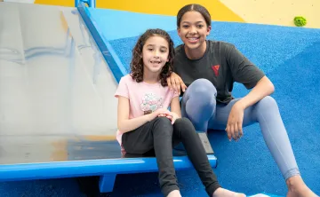 Two girls smiling at the camera