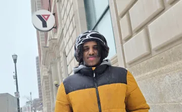 Zakariya in front of the Downtown Y