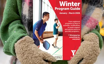 pair of hands in mittens holding the program guide
