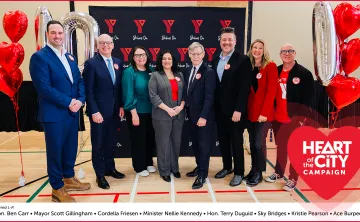 Group photo of dignitaries attending Heart of the City event