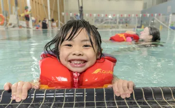 smiling child in the pool