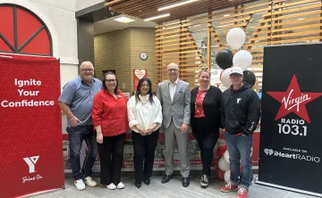 Pictured: Ken Talbot (matching $75K donor), Cordella Friesen (President & CEO of YMCA-YWCA of Winnipeg), Mayor Scott Gillingham, and Virgin Radio Winnipeg (Ace Burpee, Chrissy Troy, and Amber Saleem) stand together in support of Strong Kids.
